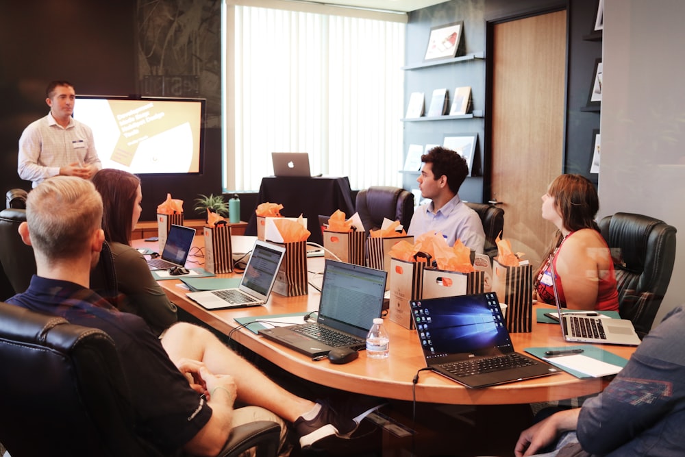 A growing company team meeting in progress